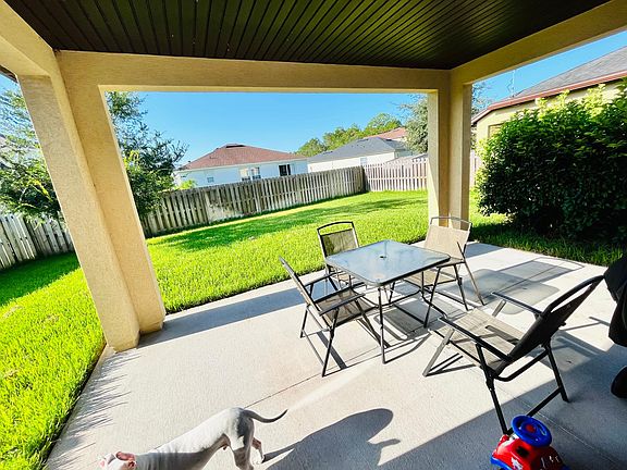 Fenced backyard. Covered patio. Large enough for family gatherings