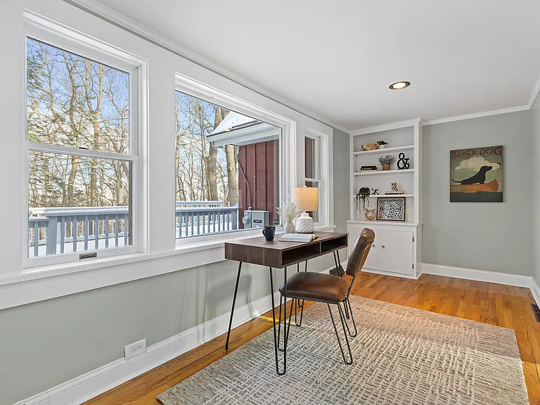 Home office/study room looking out toward the rear deck and wooded hillside