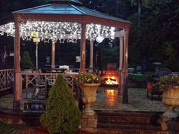 patio with fireplace