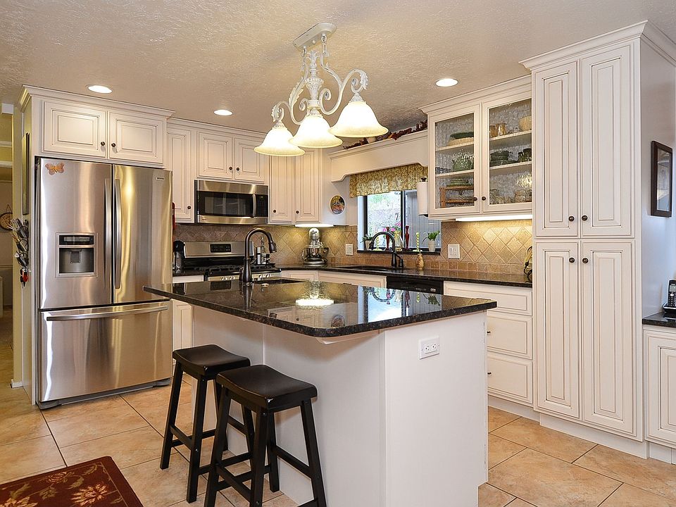 Beautifully updated kitchen with granite and stainless steel!