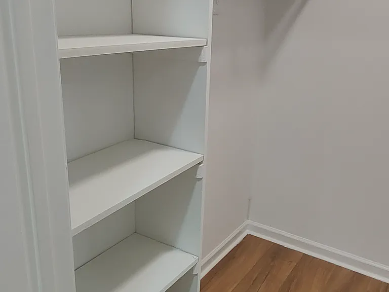 View of the master bed closet