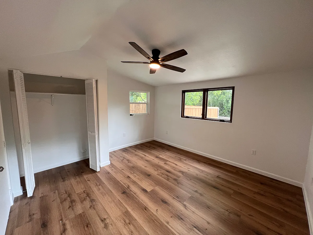 Beautiful fully repainted bedroom with luxury vinyl wood planks. - 620-622 N Austin St #C