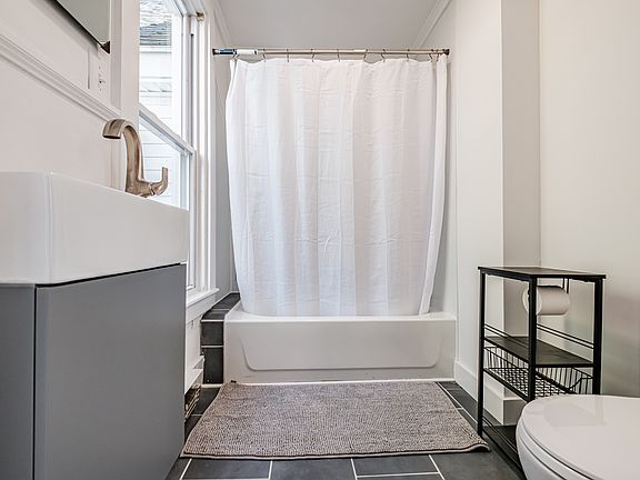 Newly renovated bathroom with shower and tub
