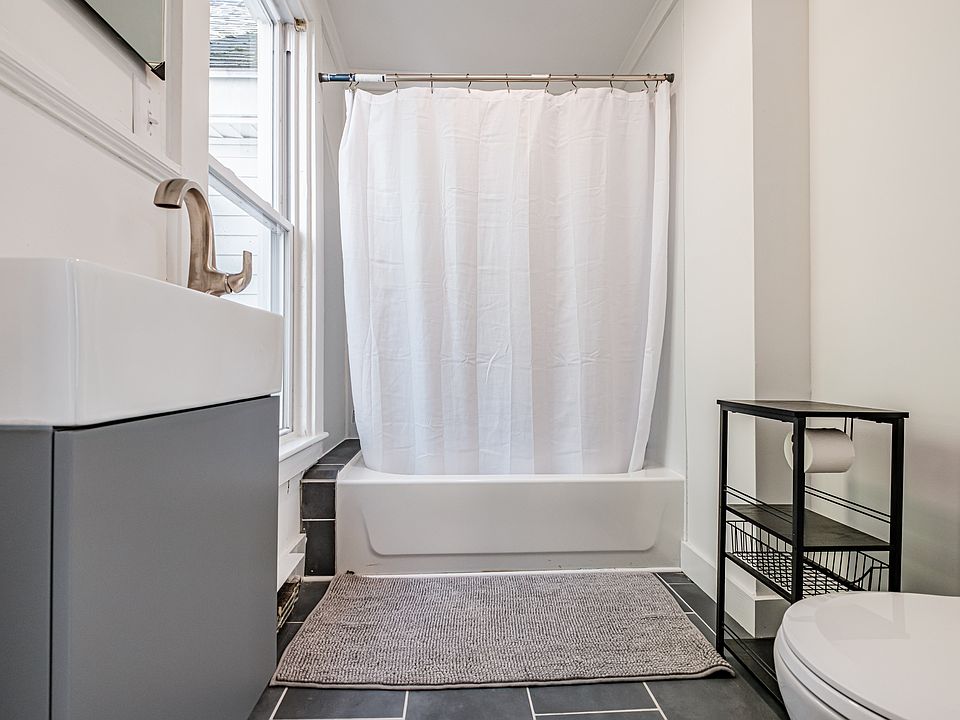 Newly renovated bathroom with shower and tub