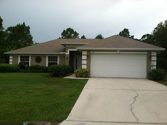 4th image of 5567 NW Cruzan Ave