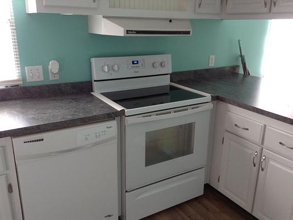 Stove 4 years old and new countertops and new hardware on cabinets and everything inside freshly painted