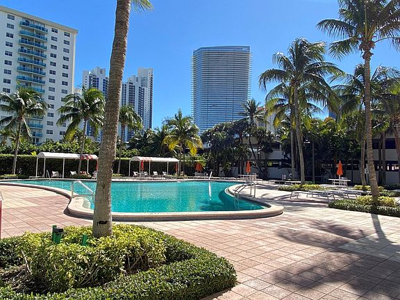 Spacious Pool Area with View of Armani