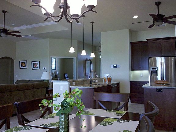 View from the Family Dining Room w/ Kitchen, Great Room & Den Beyond