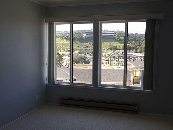 master bedroom with view of Laurelwood shopping center