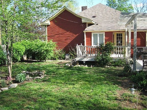Back yard w/ pond and butterfly garden