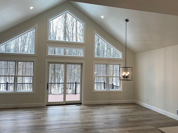 Vaulted ceiling, open concept.  Private, wooded lot.  COREtec vinyl plank (waterproof, quiet) floors