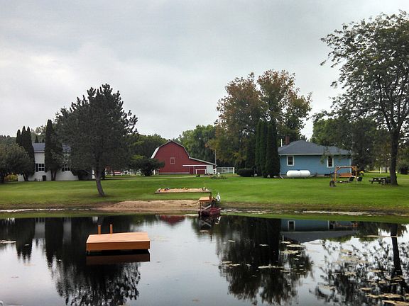 28 acres on the Salt River.  This property will take your breath away.The Salt River wanders through the 28 acres in two locations. The property is set up for horses,with 5 horse stalls , 3 pastures and a barn with a hay loft .Many Many updates----- see throughout this write-up.The home was 3 bedrooms,but a wall was removed.The wall can be put back in. The basement is a full dry basement . The home has 2 bathrooms.Anyone needing an outbuilding or polebarn,this is the place for you---
