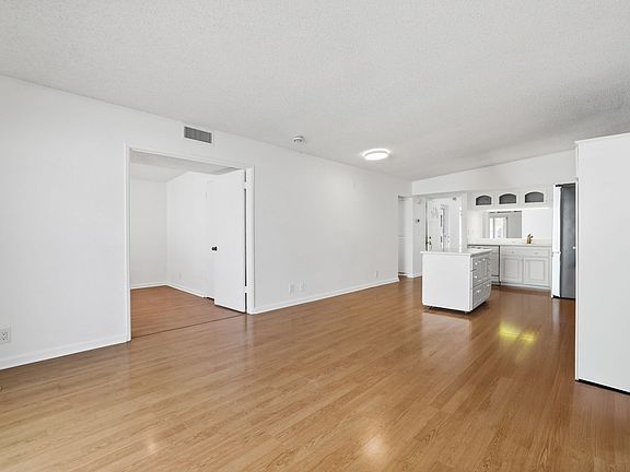 Family Room with vinyl flooring.