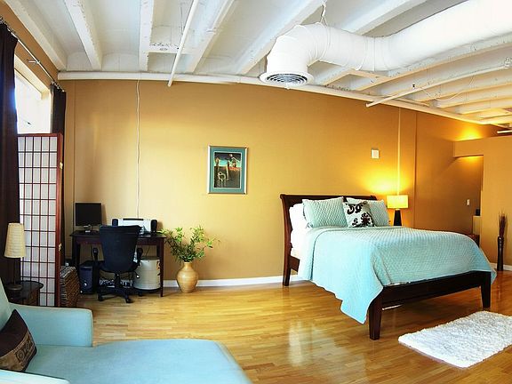 The bedroom is massive and the layout offers privacy for the owner.