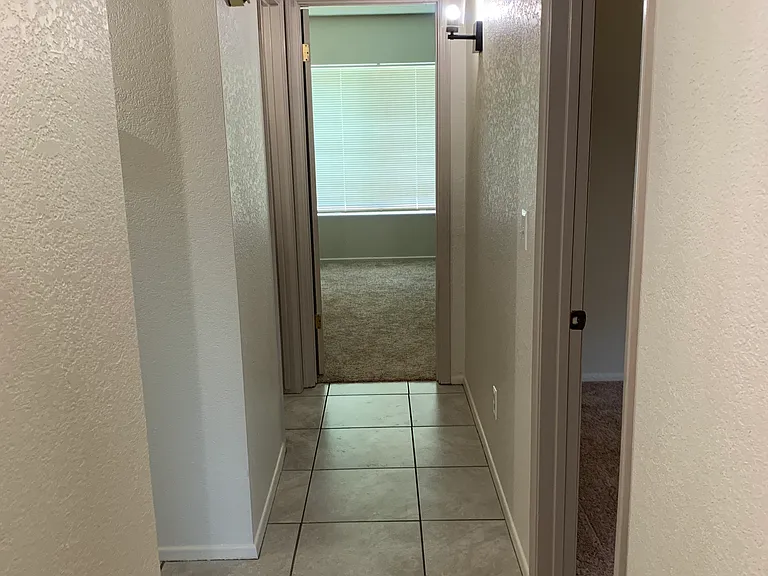 MASTER BEDROOM / HALLWAY