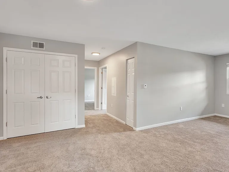Open floor plans provide comfortable living and bedroom spaces with easy flow throughout the home, professionally managed by Highlands Vista Group.