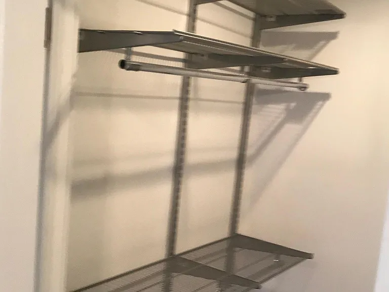 Master bedroom walk in closet on the left side