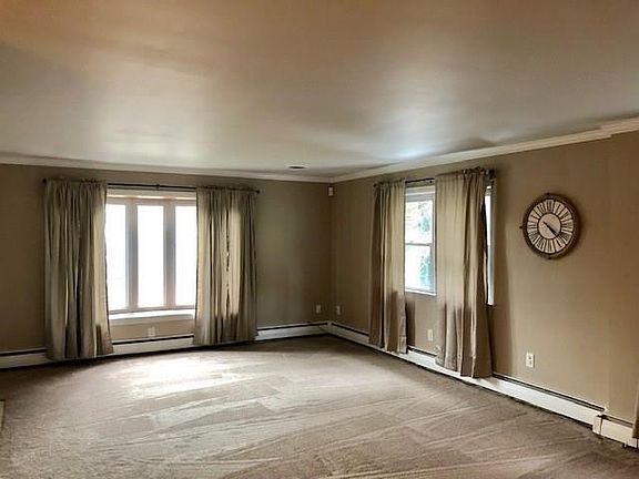Another View of Living Room with Front Bay Window.