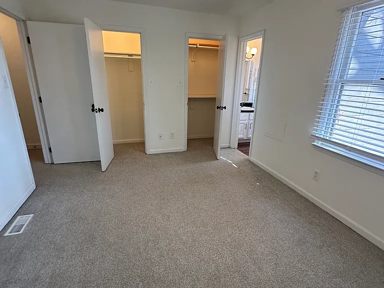Bedroom 1 with attached bathroom & two closets