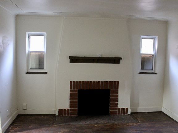 Living room, with fire place.
