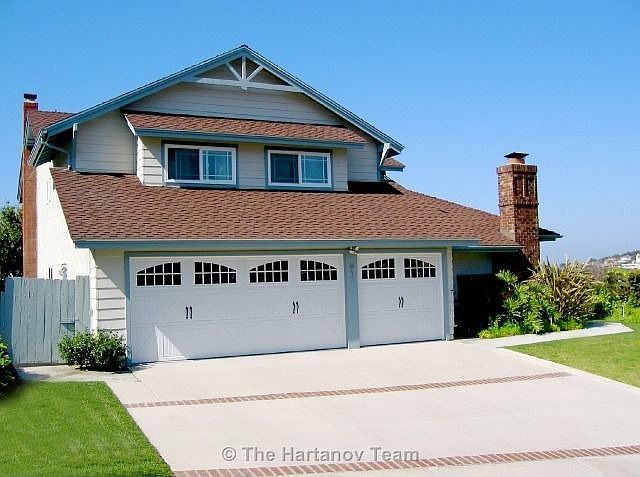 Front of home (new windows and garage doors).