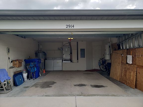 Two car garage with washer and dryer hook ups