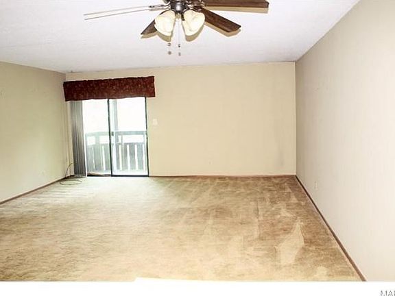 Huge Family Room open to Kitchen & Dining Area.