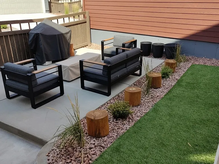 Side Yard, fully landscaped with turf and concrete patio
