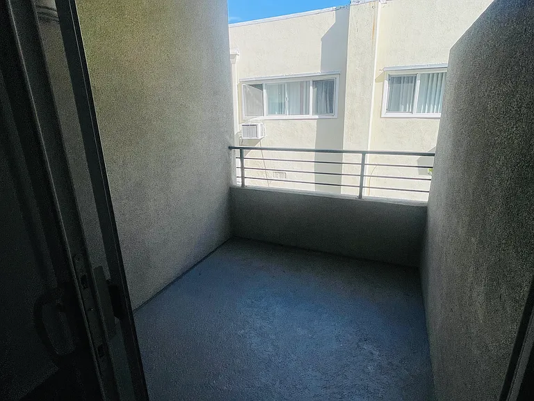 Private patio, off of the master bedroom. Great for plant lovers, private outdoor space.