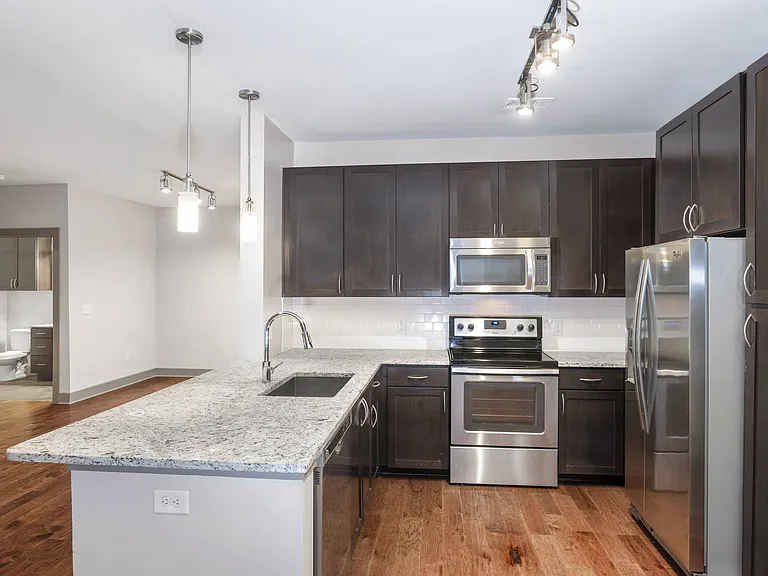 Modern Kitchens with Stainless Steel, Energy Star Appliances with Side-by-Side Refrigerator, Built-In Microwave, Tall Tub Dishwasher and Electric Range