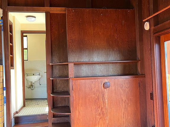 Stairs up to bathroom and kitchen.