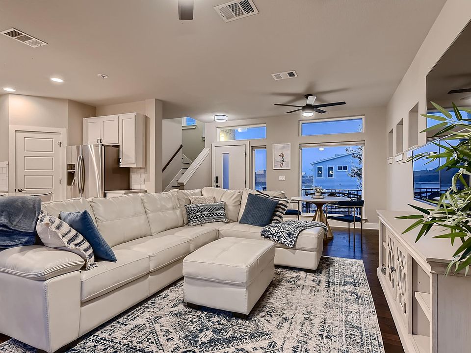 Living Room With 3 Smart TVs