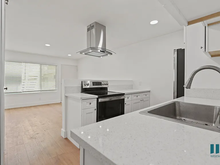 Open-Concept Kitchen, Dining, and Living Room Space