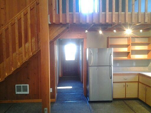 kitchen, hallway to front door and bath/utility and bedroom