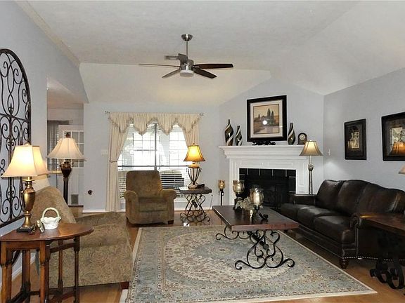 High ceilings in the living room, dining room, and foyer add to the spacious feel of this beautiful home.