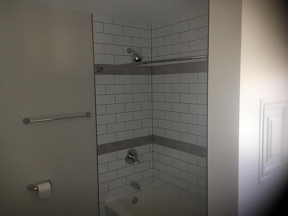 Tube and shower with subway tile