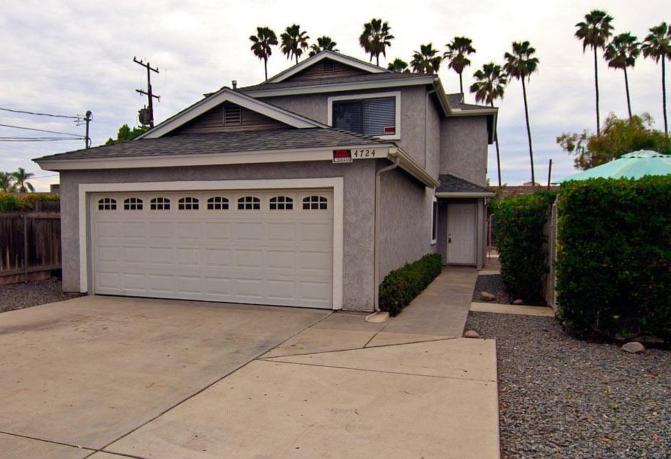 This house sits off the street and is two stories. 3 bedrooms upstairs and 1 downstairs.