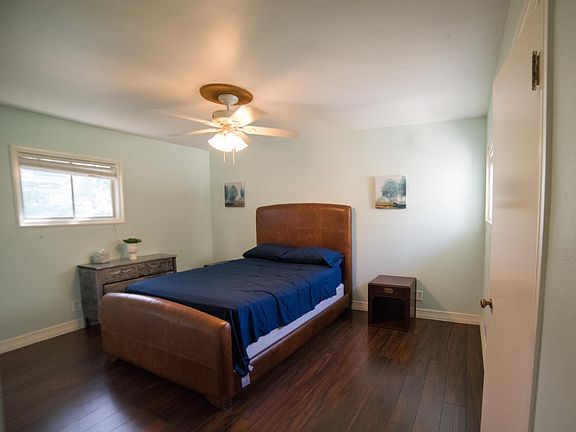 Spacious master bedroom can easily hold a King sized bed (queen bed in the picture).