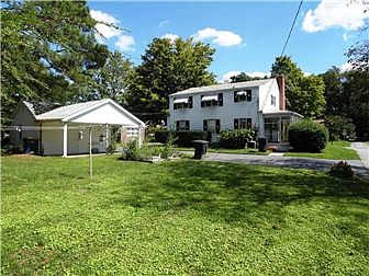 1/4 acre lot with rear/side alley access