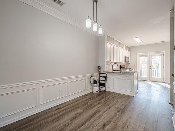 Living Room looking into dining/kitchen