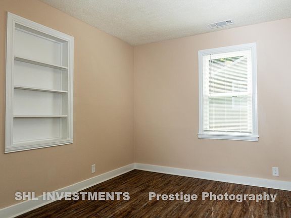 Bedroom #2 features beautiful build-in bookshelf