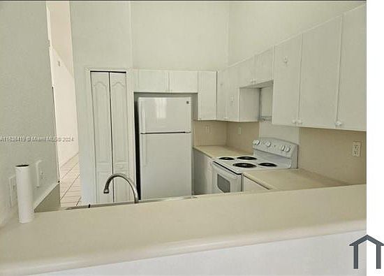 5th image of 1666 SE 27th Ct Unit 206