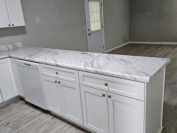 Kitchen showing family area