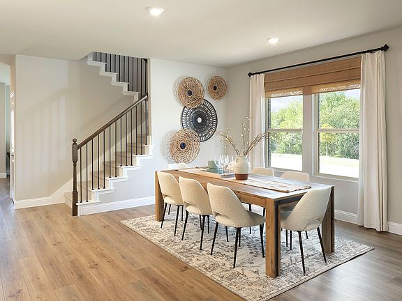 Enjoy family dinners around the dining table.