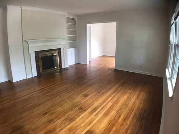 Front living room with built in shelves.