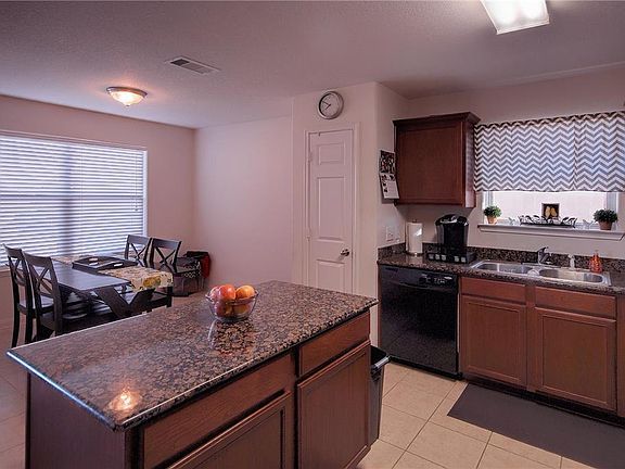 Beautiful island kitchen with granite counters