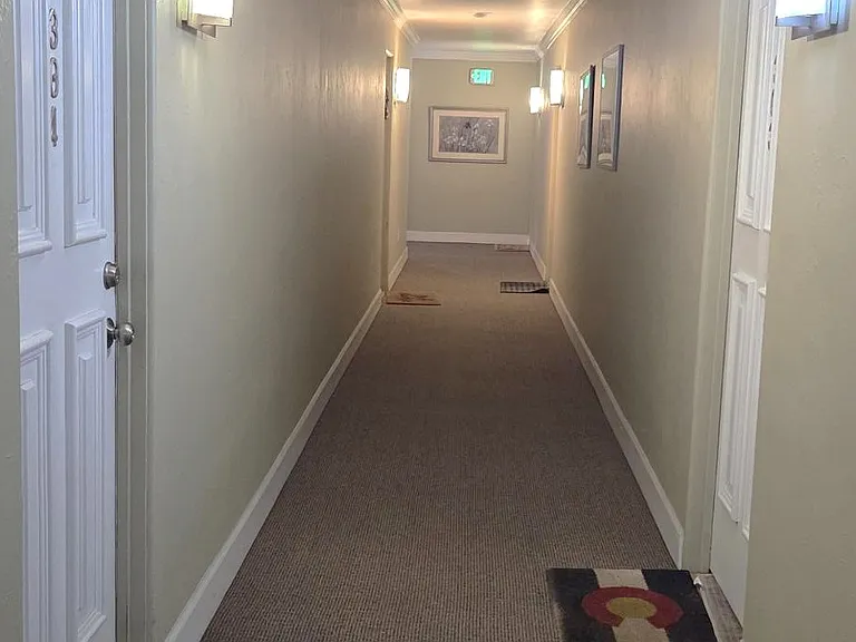 Quiet, bright and secure third floor hallway.