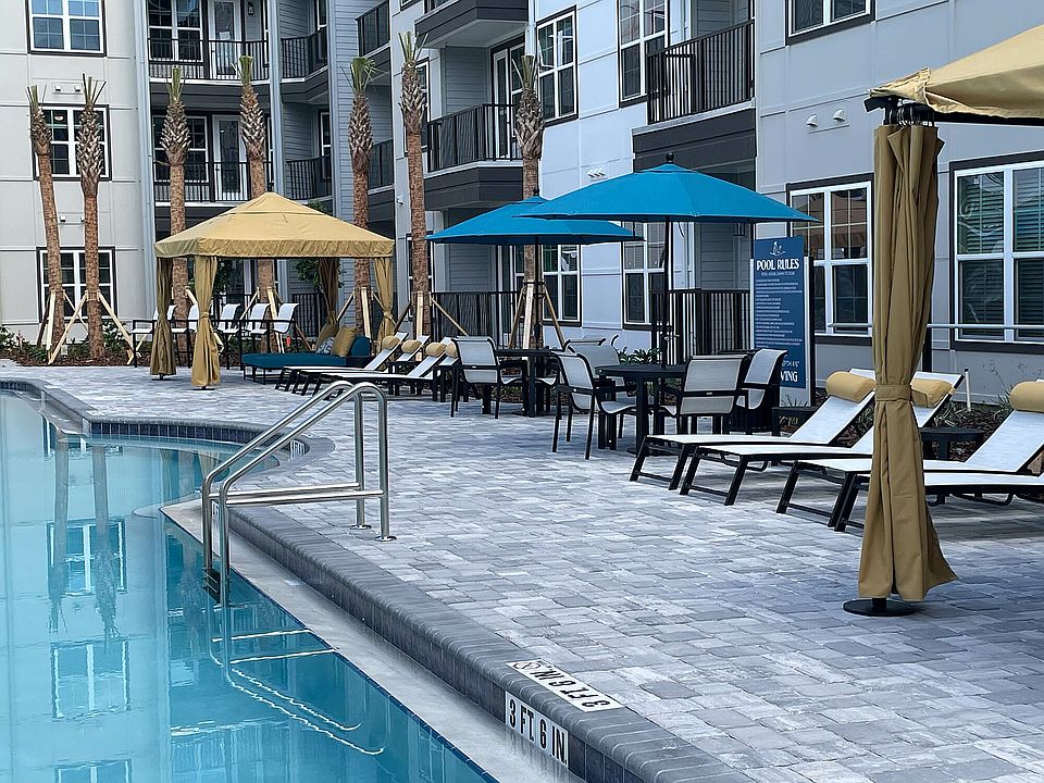 Experience relaxation at our upscale poolside haven, perfect for sunny days.
