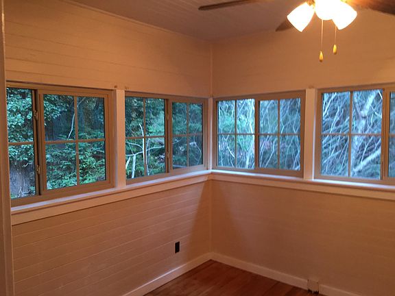 Bedroom #1 upstairs with many windows