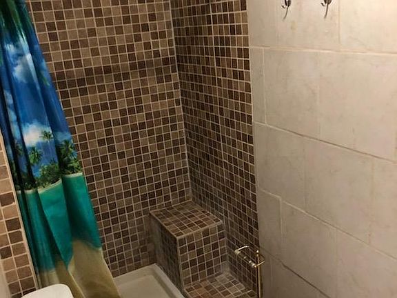 Bath with walk in shower